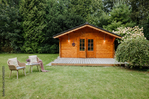 wooden holiday house. wooden house in the garden for summer days 