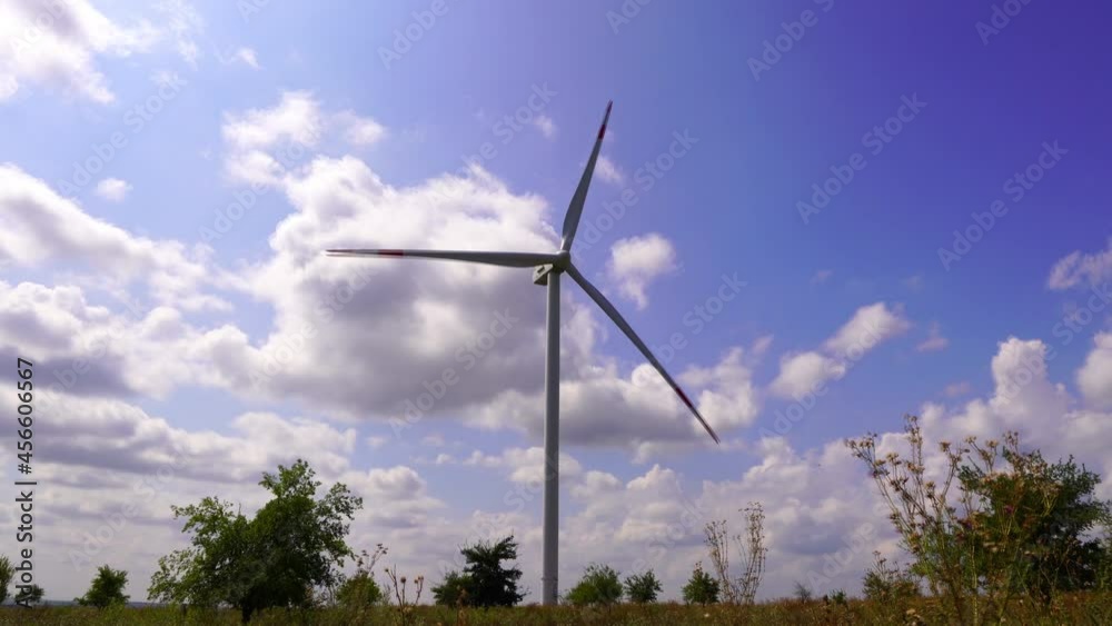wind turbine with beautiful cloudy sky, video loop, alternative energy concept wind turbine with beautiful cloudy sky, video loop, alternative energy concept