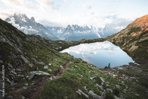Photographer Hiker Looking at Chamonix Mont Blanc Lake