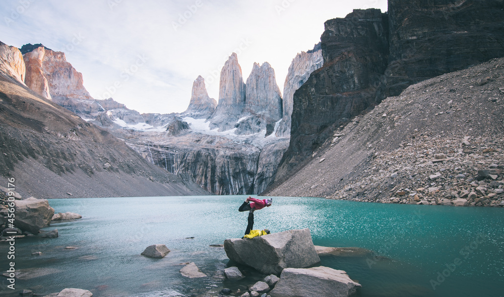 Couple Performing AcroYoga in front of Torres Del Paine Patagonia