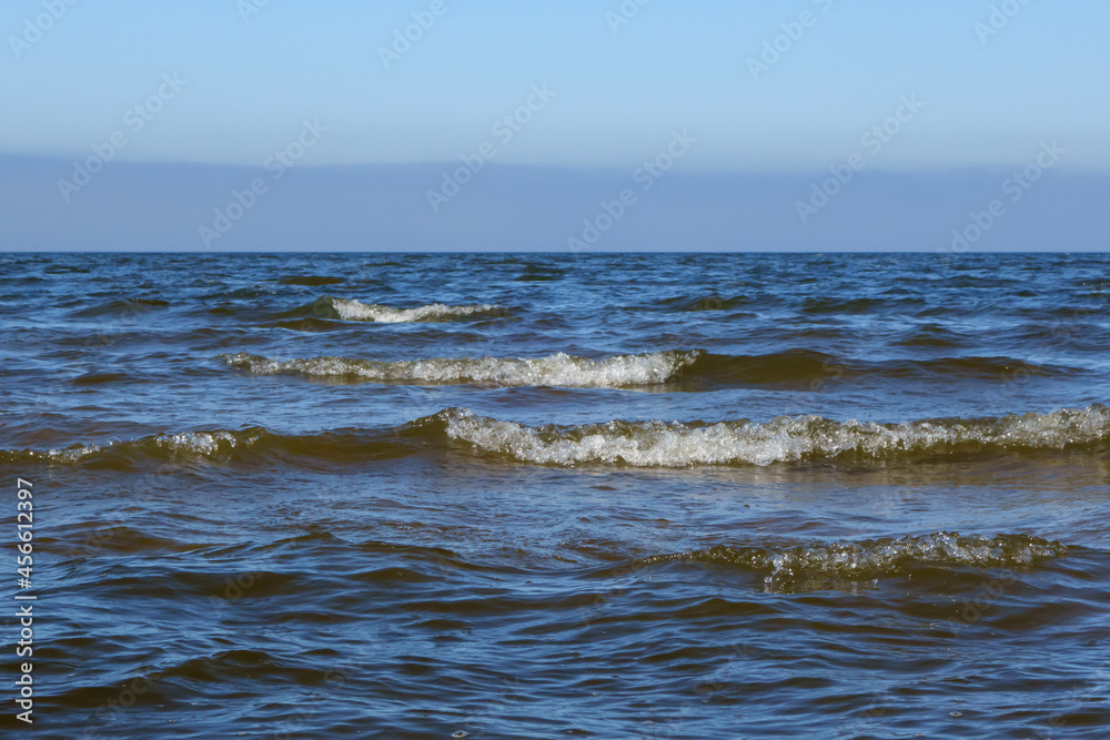 Water surface with small shallow waves. Beautiful seascape