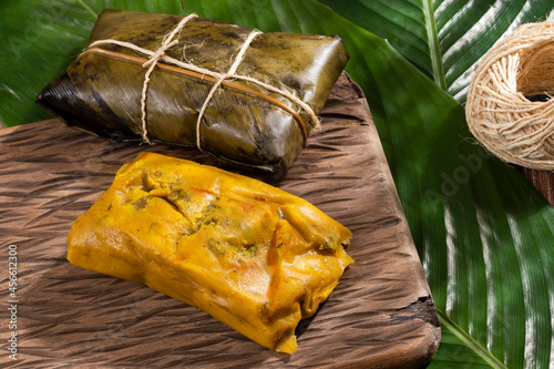 Tamale Typical Colombian Food Wrapped In Banana Leaves photo