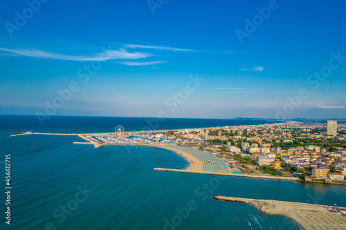 Aerial photo of the coastline and canal of the resort of Rimini on a sunny day