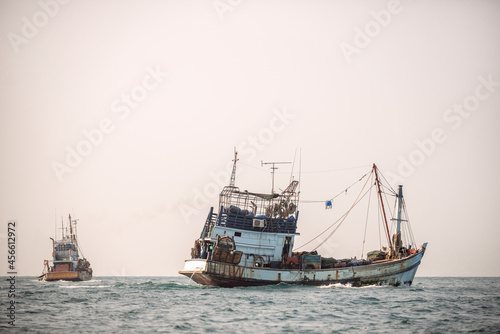Thai fishing boats sailing the Andaman Sea.