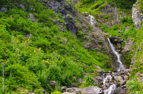 Small waterfall in the mountains in summer © m.lexandrovna
