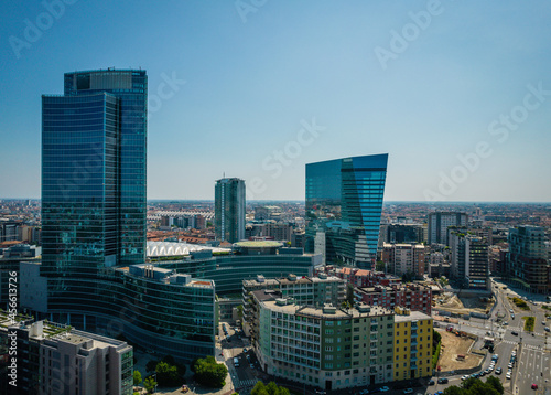 Aerial view of skyline of Porto Nuova district in Milan. Office building on other skyscrapers in horizon