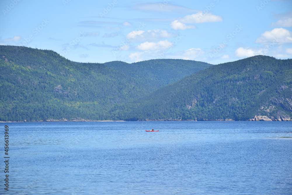 Saguenay Fjords National Park, Sepaq, Quebec, Canada: View from the shores of the Baie Éternité, looking northwards with a canoe in the distance