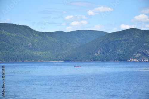 Saguenay Fjords National Park, Sepaq, Quebec, Canada: View from the shores of the Baie Éternité, looking northwards with a canoe in the distance