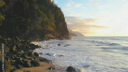 4K Aerial shot of Hawaii Napali Coast mountain at sunset