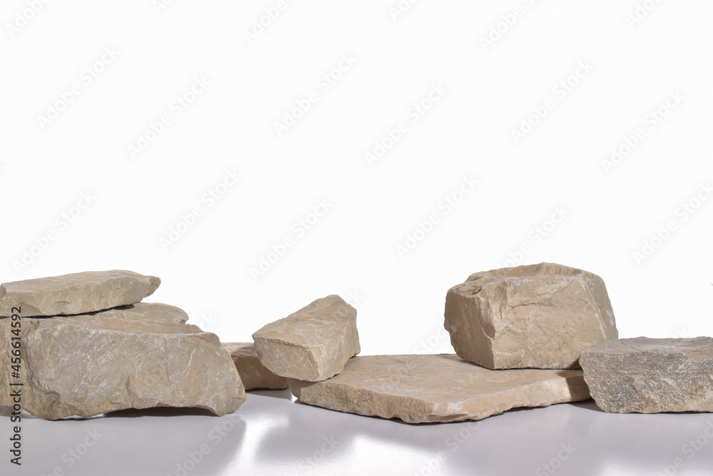 Minimal. A podium made of stone for the presentation of the product . The pedestal is made of natural natural material.