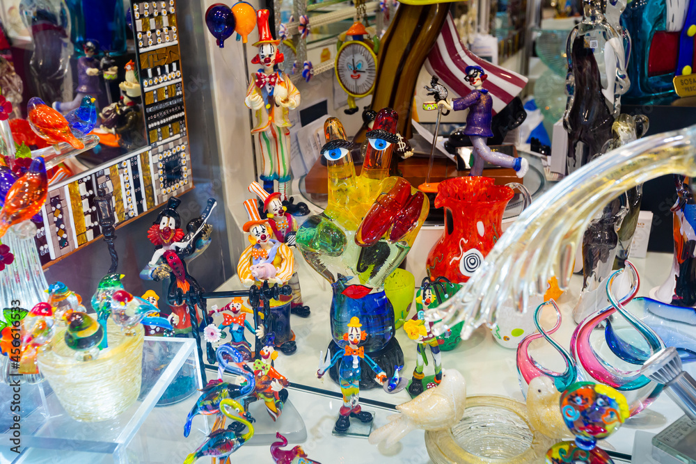 Colorful mosaic ceramic plates, mugs, clocks on showcase of Barcelona gift  shop. Traditional souvenirs Stock Photo | Adobe Stock