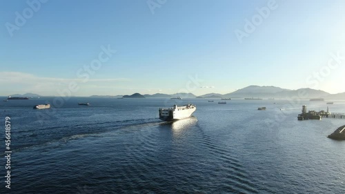 RoRo Roll on-Off vessel cruising slowly leaving Hong Kong bay.