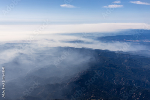 Aerial view of wildfire smoke in Cascade Mountains, Washington, USA