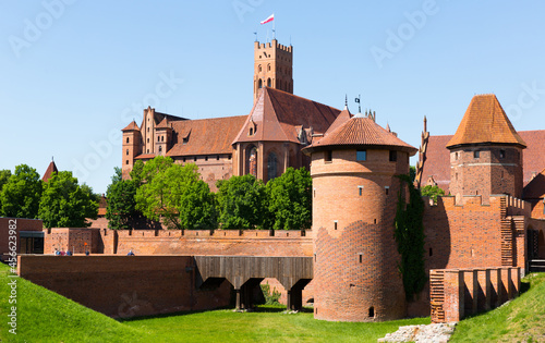 View of largest medieval brick Castle of Teutonic Order in Malbork, Poland . photo