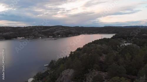 Exploring the bays and coastline of Kragerofjorden, Norway, sunset drone view photo