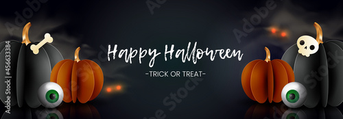 Happy halloween horizontal banner design. Paper pumpkins with glass eyes, bones, ominous lights on dark background in the fog.