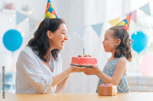 Canvas Print Mother and daughter are celebrating birthday.