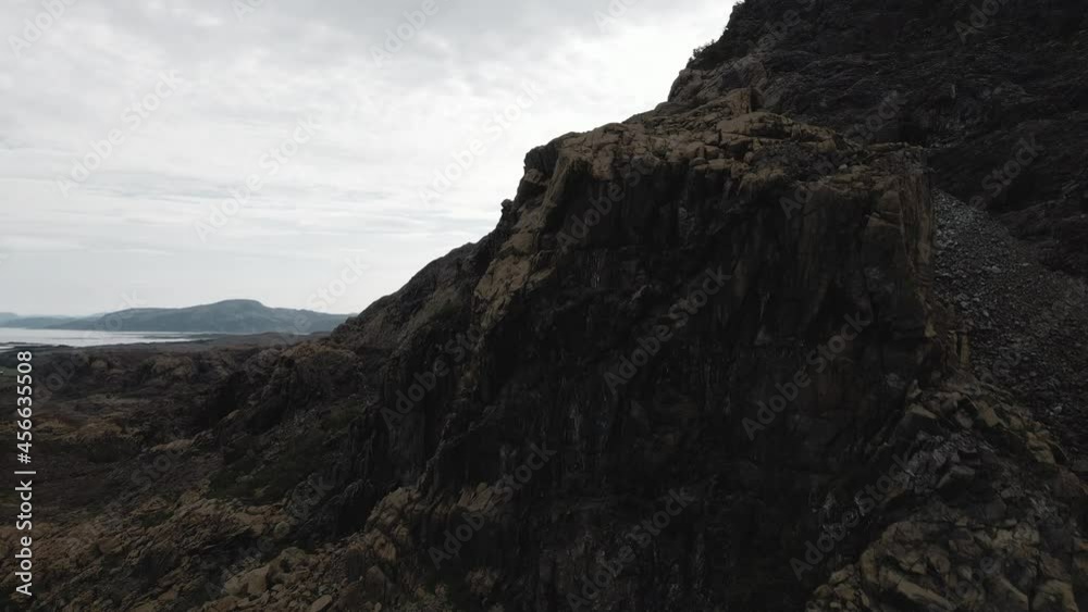 Rising over a rough rocky Leka Mountain in Norway -Aerial Rising over a rough rocky Leka Mountain in Norway -Aerial