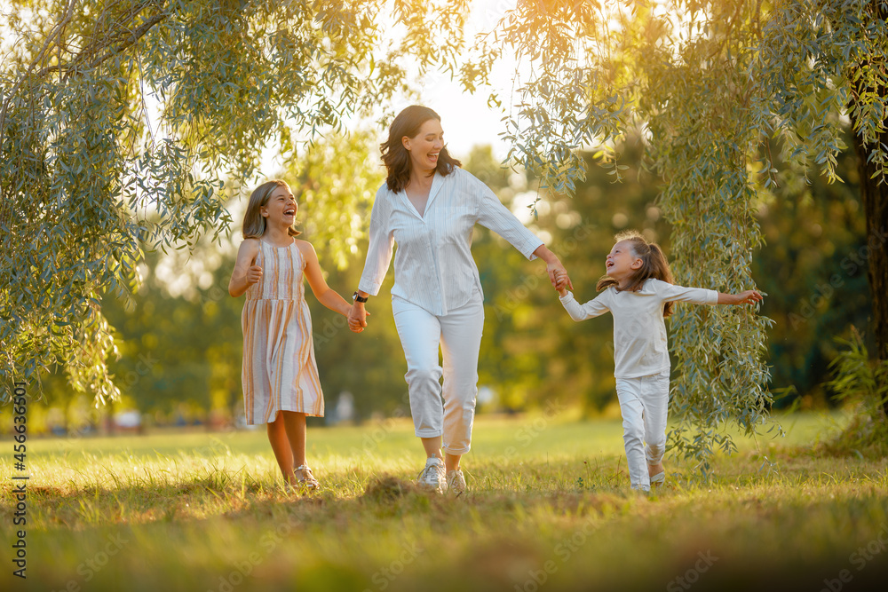 Fototapeta premium Happy family at sunset