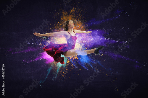 Female dancer against abstr...