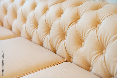 Bild auf Leinwand part of white leather sofa for home and office