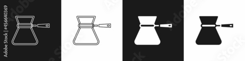 Set Coffee turk icon isolated on black and white background. Coffee cezve. Vector