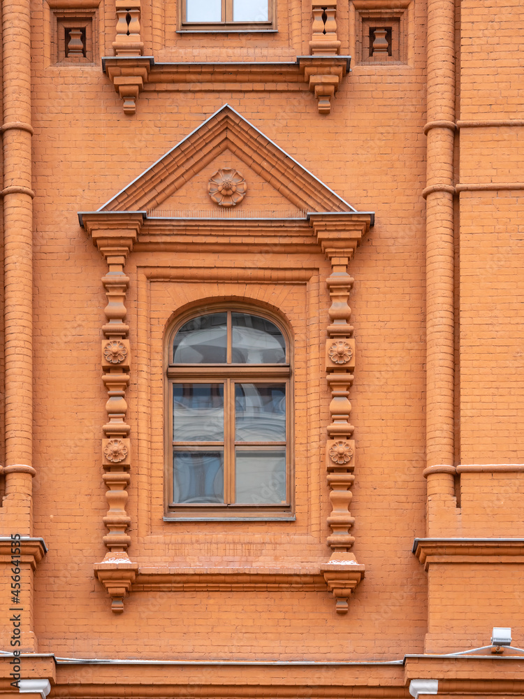 Facade detailed of an old building of the 19th century of Museum of Patriotic War of 1812 on Manezhnaya Square in Moscow, Russia