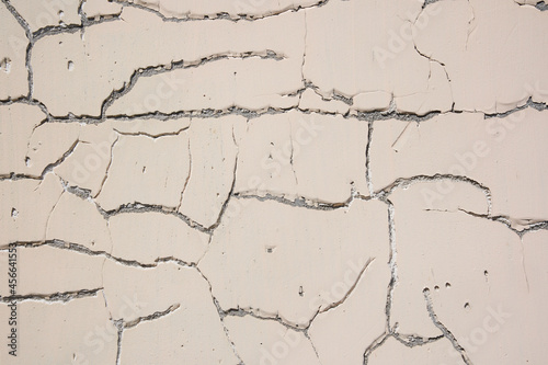 Overlay for your design. Background texture of a white cement wall with a crack. A crack in the old wall. High quality photo