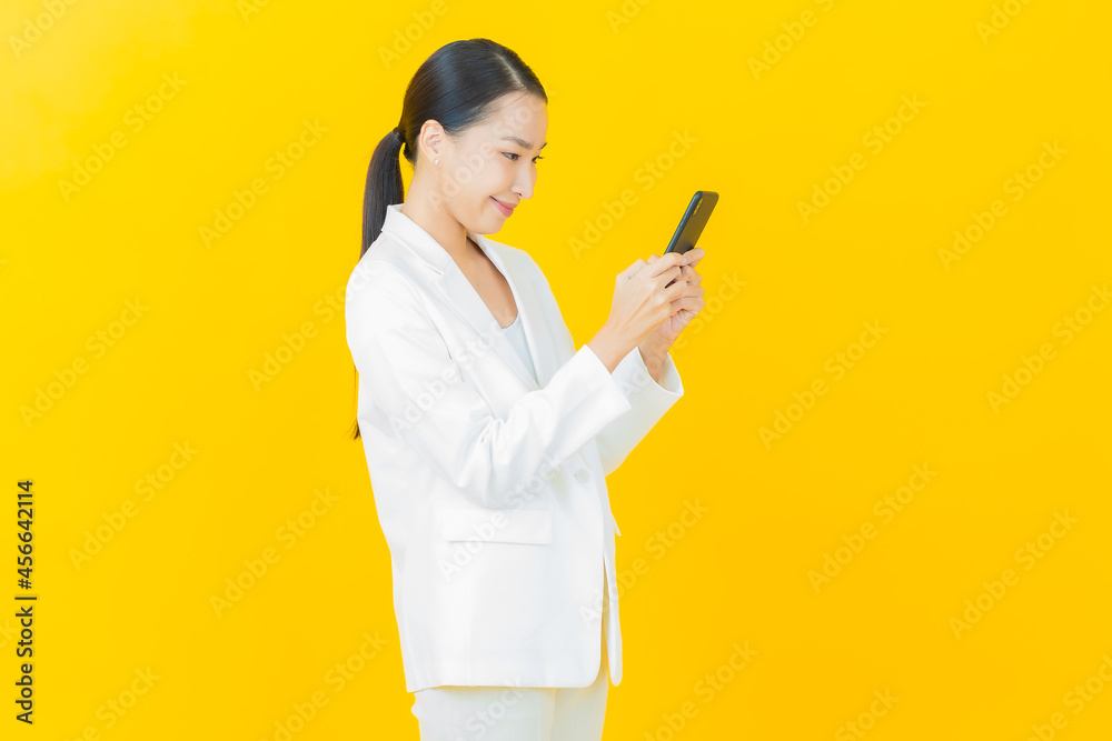 Portrait beautiful young asian woman smile with smart mobile phone Portrait beautiful young asian woman smile with smart mobile phone