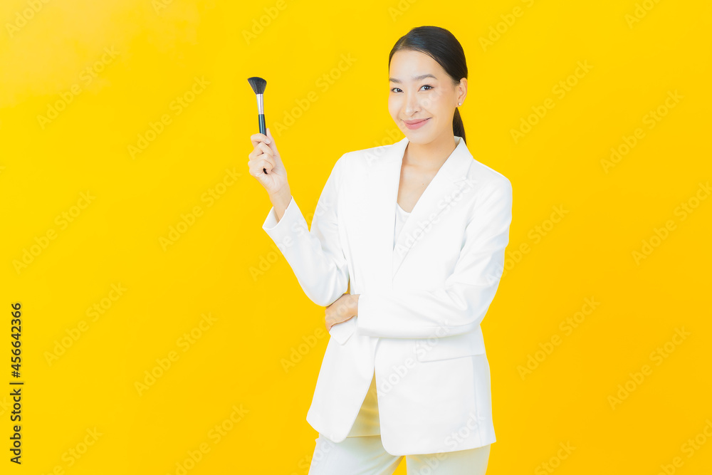 Portrait beautiful young asian woman with make up brush cosmetic Portrait beautiful young asian woman with make up brush cosmetic