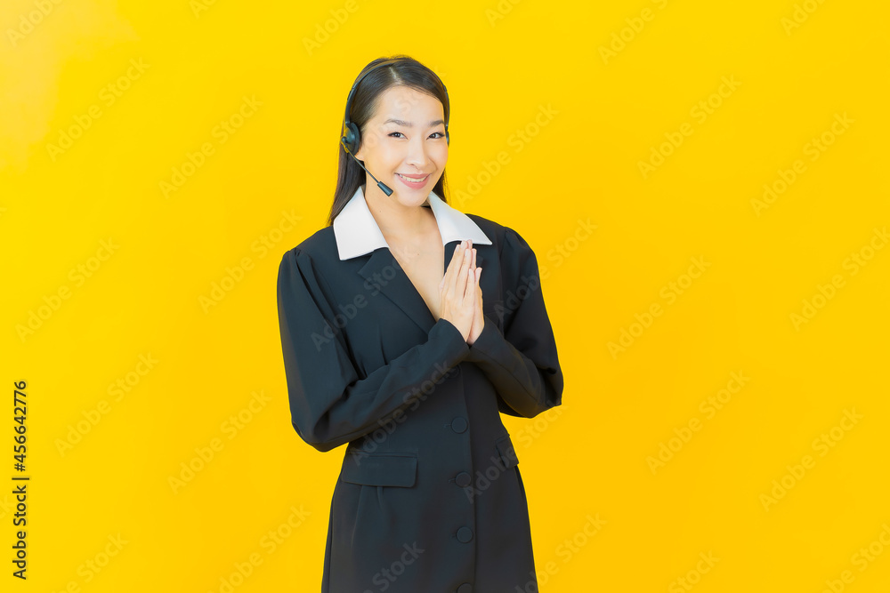 Portrait beautiful young asian woman with call center customer care service center Portrait beautiful young asian woman with call center customer care service center