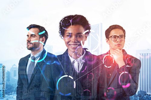 Group of business colleagues working on technology at business process to achieve tremendous growth in commerce. Worldwide process to conduct transactions. Tech hologram icons over Kuala Lumpur photo