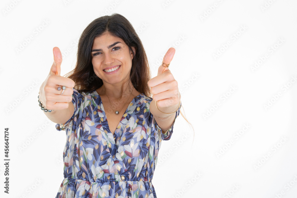 happy woman giving thumbs up fingers over white background copy space happy woman giving thumbs up fingers over white background copy space