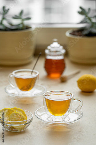 tea drinking in transparent glass dishes