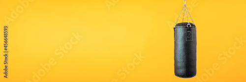 Εκτύπωση καμβά punching bag hanging on colorful background with blank space