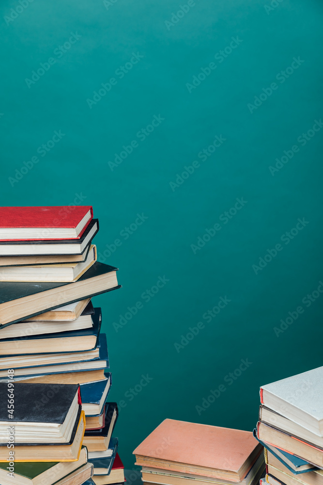 stacks of books for teaching knowledge of the university library green background stacks of books for teaching knowledge of the university library green background