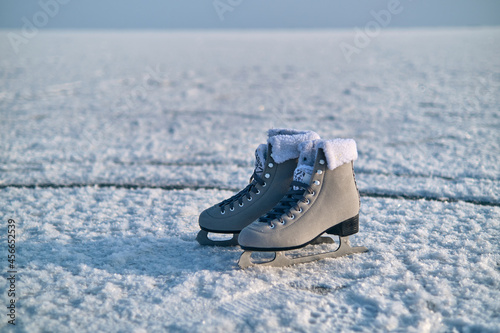 A pair of skates stay on the ice