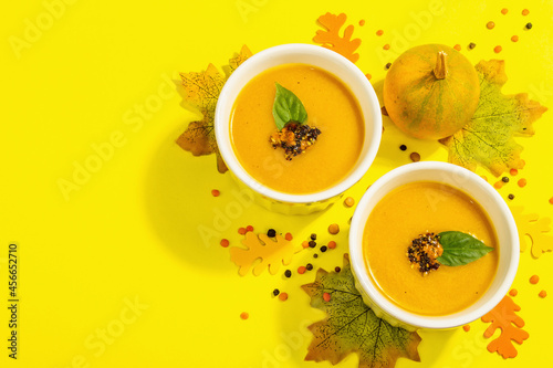 Vegetable cream soup. Traditional autumn composition. Healthy hot food, spices, foliage