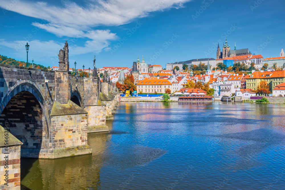 Prague Czech Republic, city skyline at Charles Bridge and Prague Castle, Czechia with autumn foliage season