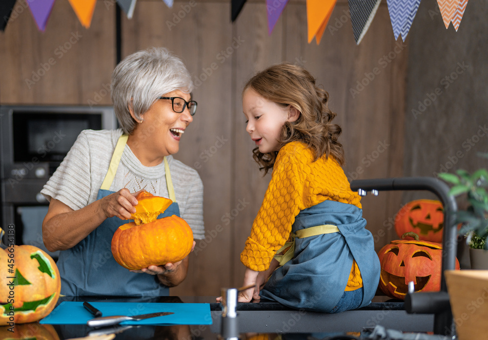 Fototapeta premium Happy family preparing for Halloween.