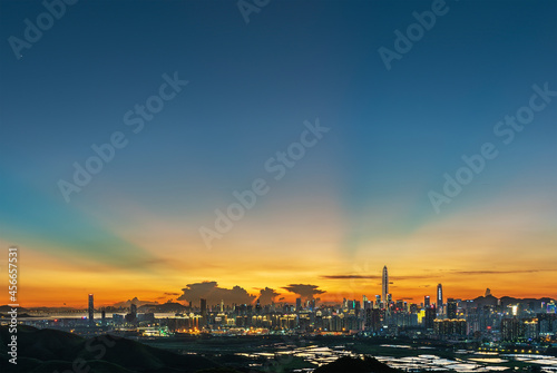  v-shaped anti-crepuscular ray over Shenzhen city during sunset, viewed from Hong Kong border