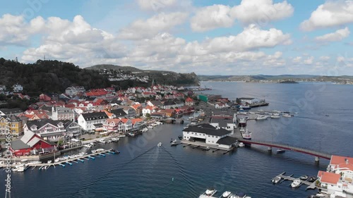 Static aerial shot over docks at charming coastal town of Kragero, Norway photo