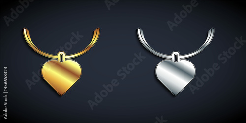 Gold and silver Necklace with heart shaped pendant icon isolated on black background. Jewellery decoration. International Happy Women Day. Long shadow style. Vector