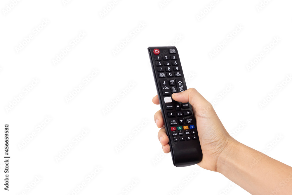 Close-up woman of right hand held, use finger press button on black remote control isolated on white background. Concept of technology, connection, communication, social Close-up woman of right hand held, use finger press button on black remote control isolated on white background. Concept of technology, connection, communication, social