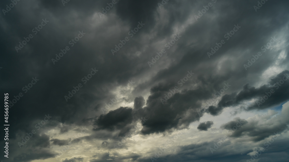 Dramatic storm clouds at dark sky in rainy season