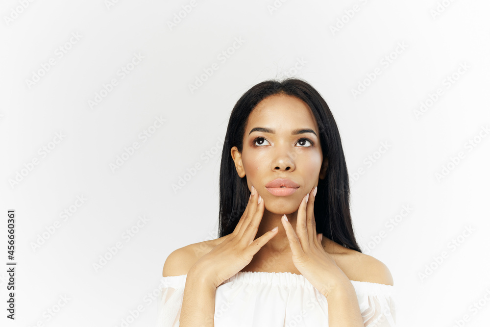 woman american appearance hairstyle cosmetics light background woman american appearance hairstyle cosmetics light background