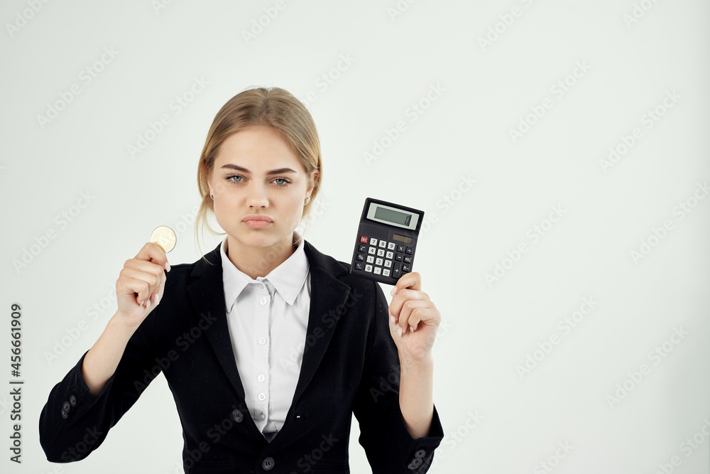Business woman with calculator and coin Bitcoin finance economy