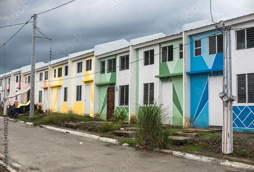 Naic, Cavite, Phililippines - Rows of newly built low-cost housing. Cheaply constructed Row houses. photo