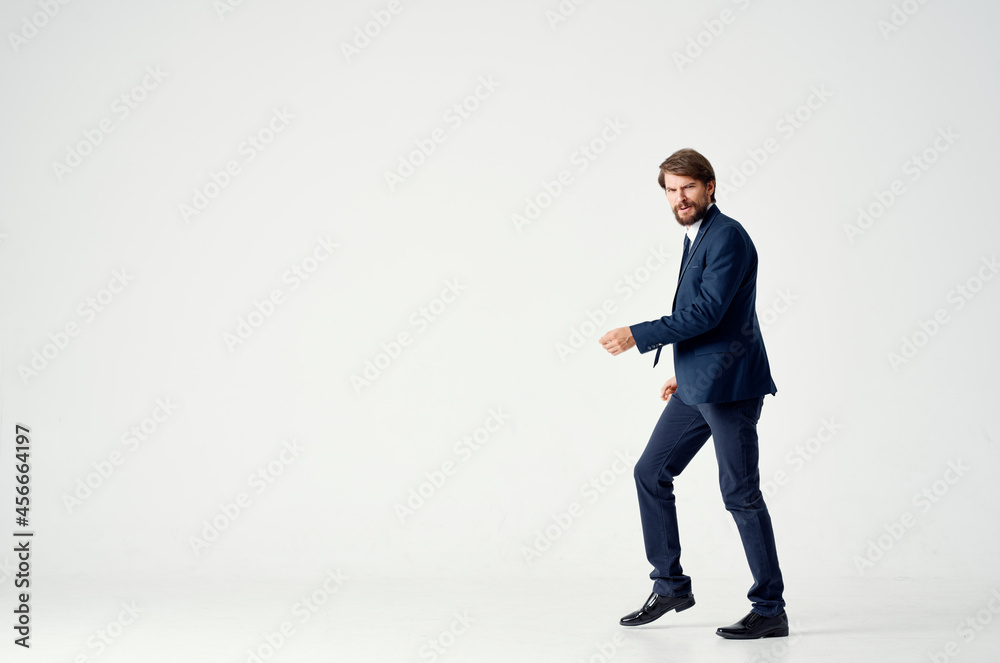 a man in a jacket and tie movement Jump office Studio a man in a jacket and tie movement Jump office Studio