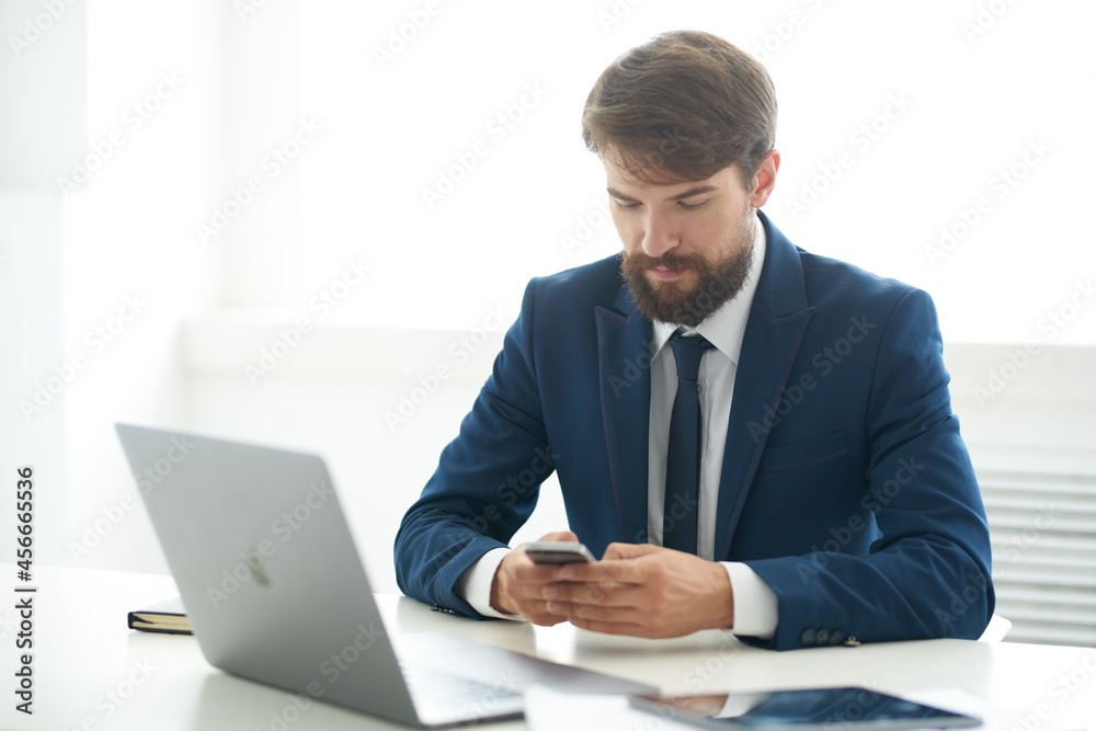 bearded man sitting at his desk communication official office bearded man sitting at his desk communication official office